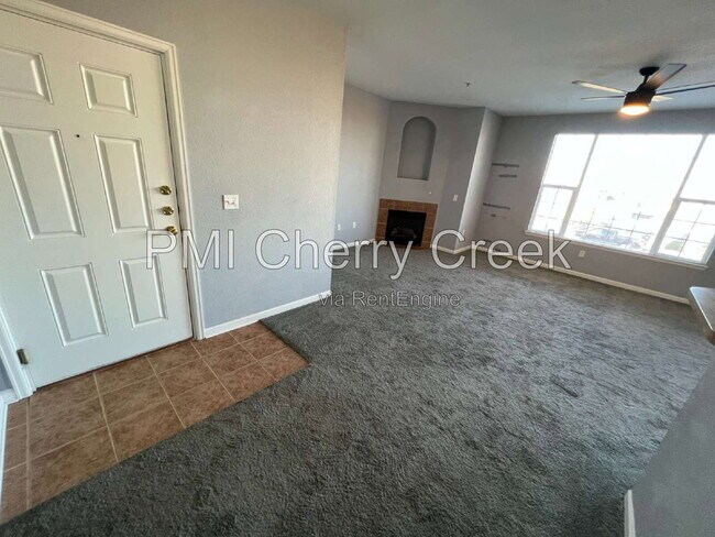 Building Photo - 5705 N Genoa Way Unit 208