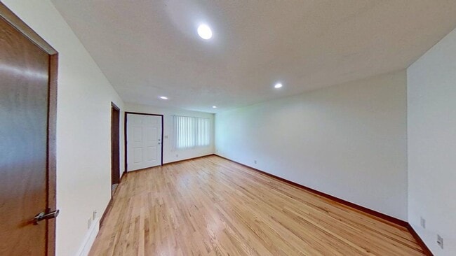 Photo - Updated two bedroom duplex, new stainless steel appliances, garage, and hardwood floors