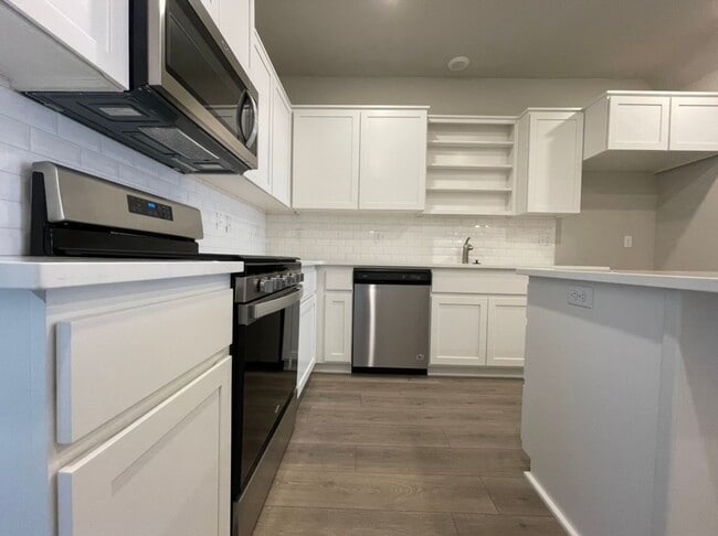 Photo - Modern 3-Bed, 2.5-Bath Home with Quartz Counters, Central A/C, and Prime Location!