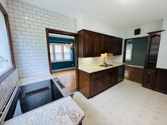 Photo - Charming 3-Bedroom Oasis with Elegant Touches & Finished Basement on Washburn Ave!