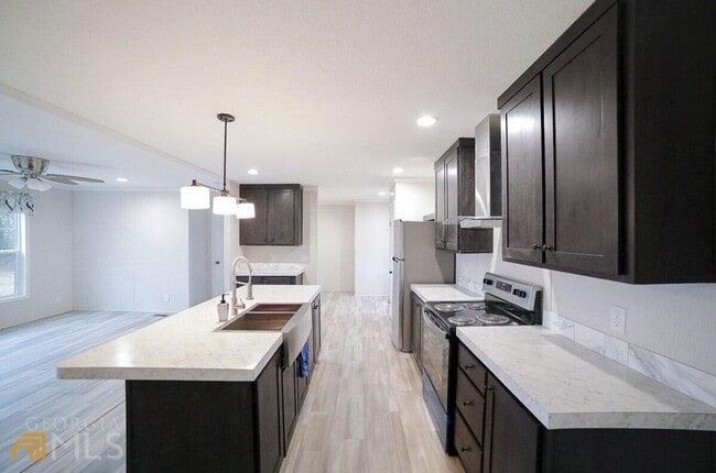 Photo - Spacious 4-Bedroom Home with Lawn Maintena...