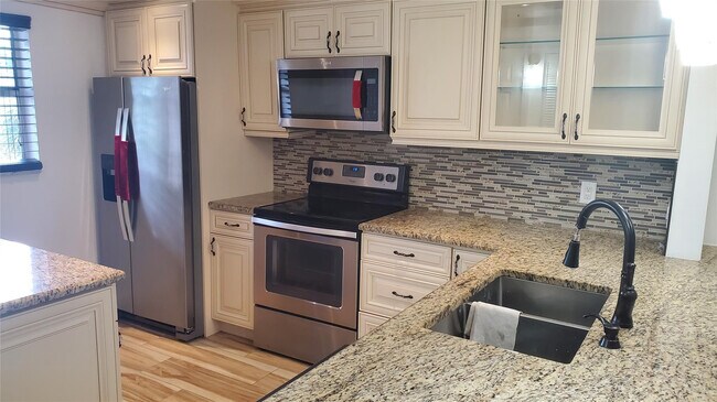 Building Photo - 10110 Boca Entrada Blvd Unit 302