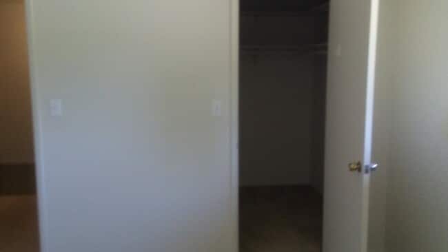 Guest Room Closet - 6576 Harmon Dr Unit Condo