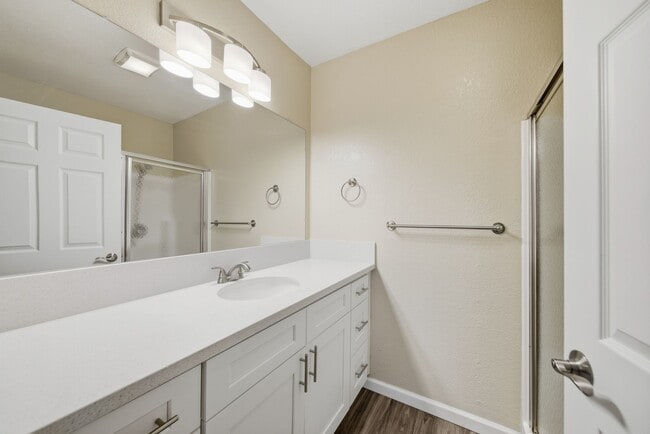 A Premium Primary Bathroom at Midway Gardens Apartments