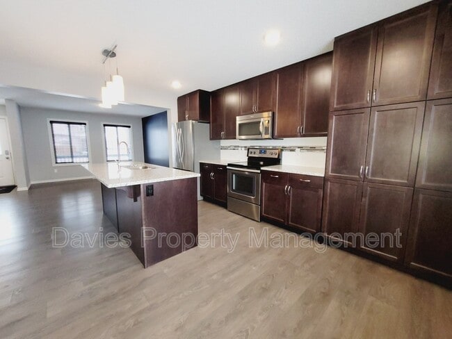 Photo - 16027-16013 13 Ave SW