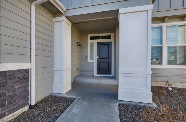 Photo - Custom Hunter-Douglas shutters throughout.