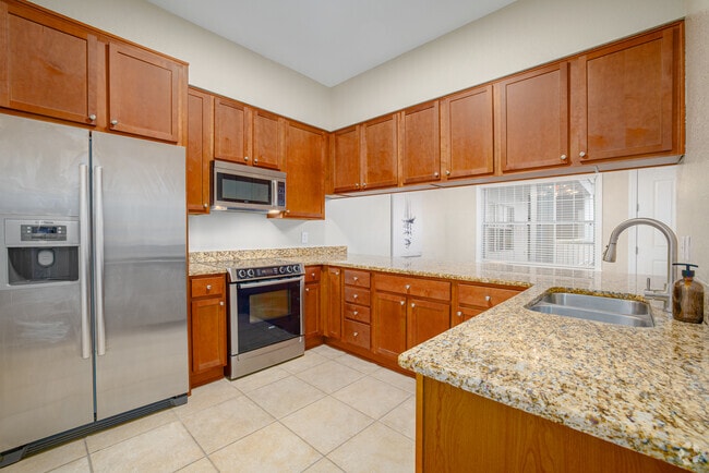 2BR, 2BA - 1,200 SF – Kitchen - The Palms Condominiums