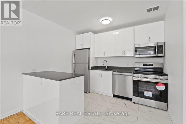 Photo - 3111 Eglinton Ave E Unit 102