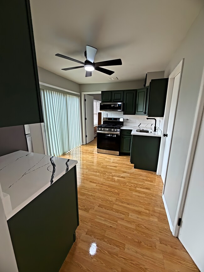 Building Photo - 8304 S 79th Ct Unit 1S