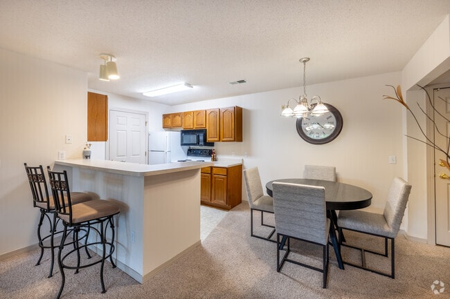 2BR, 2BA - 1,064SF - Kitchen and Dining Area