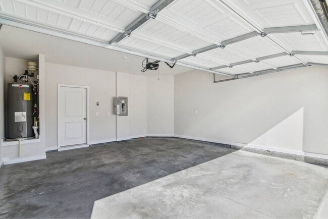 Private Garage attached to each home. - Poplar Row