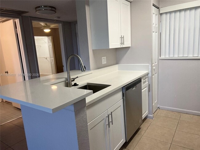 Building Photo - 2881 N Oakland Forest Dr Unit 210