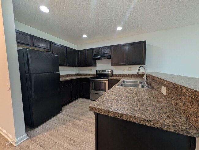 Photo - NOW AVAILABLE - 3/2 Duplex on this 12 mo Lease - Conveniently located off Lewis Speedway near St ...