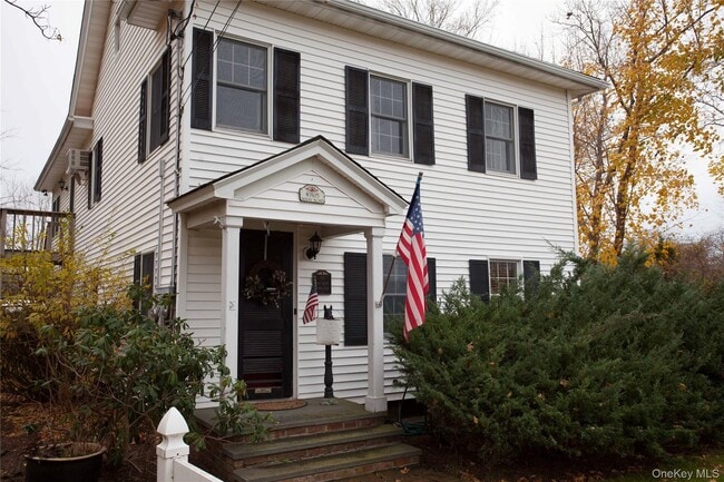 Building Photo - 49925 Main Rd Unit 2nd Floor