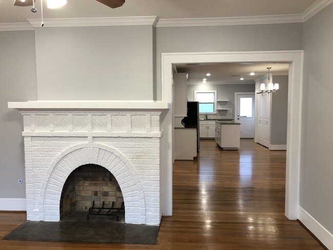 Gas fireplace with entry to dining and kitchen area - 1712 Blodgett St Unit #2