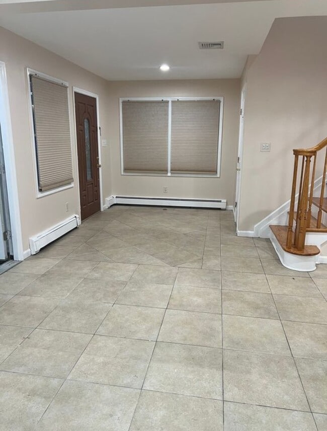 3 - Front Entrance - 100 5th Ave