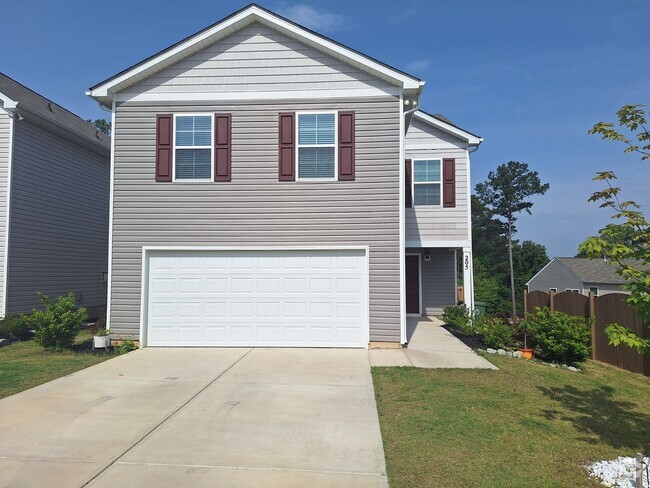 Building Photo - Lovely Four Bedroom Home  Appropriately 5 ...
