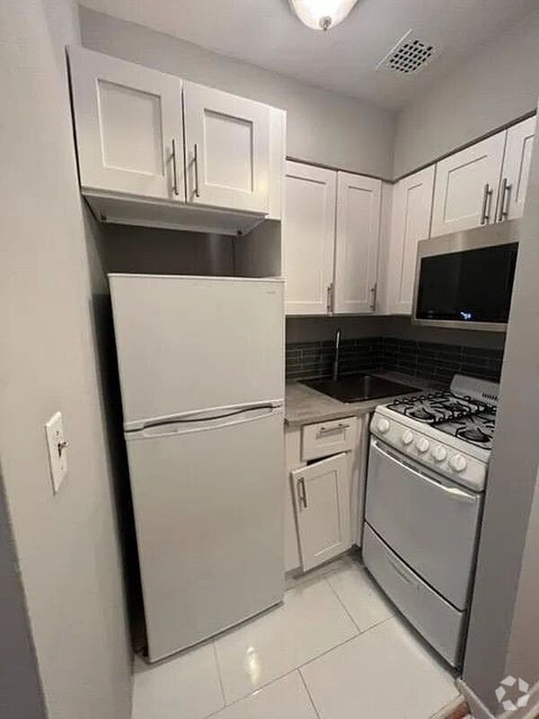 Building Photo - 213 E 26th St Unit 2A Rental