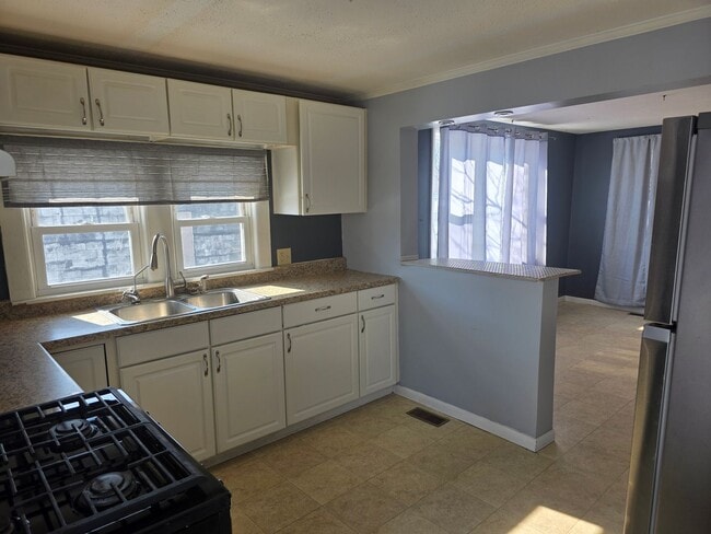 Photo - Spacious 3-Bedroom, 2-Bathroom Home – $1,525/Month | Move-In Special Available