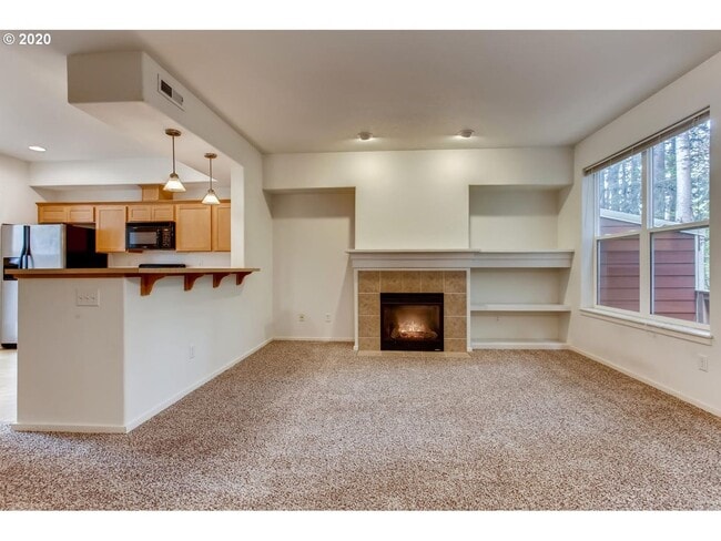 Photo - Forest-View Three-Level Townhome with Ensuite Bedrooms, Attached Garage & Fenced Yard