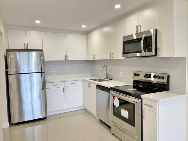 Building Photo - 16851 NE 23rd Ave Unit A207