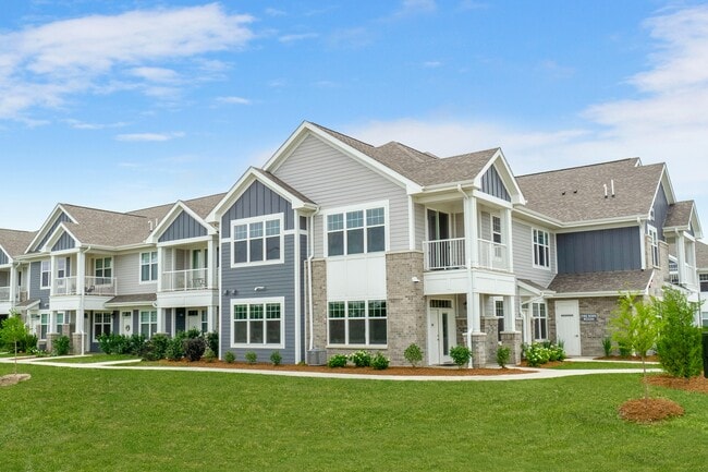 Seasons at River View Apartments in Pleasant Prairie, Wisconsin. Luxury, condo style, studio, 1 bedroom, 2 bedroom, and 3 bedroom apartments, with private garages and entries. - Seasons at River View Apartments