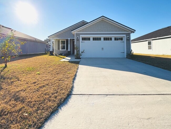 Building Photo - Move-In Ready 3BR Home with Open Layout, Garage & Water Views