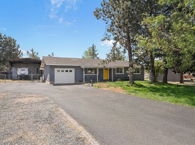 Building Photo - Charming 3-Bedroom Bend Home on 1/2 Acre with Expansive Yard, Mature Trees & Covered RV/Boat Storage
