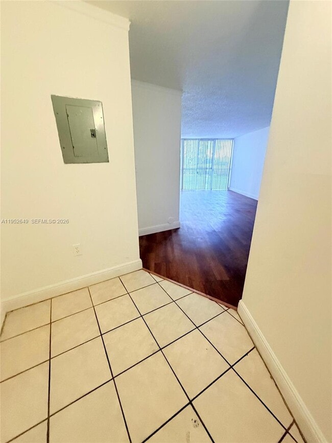 Building Photo - 6995 NW 186th St Unit E104