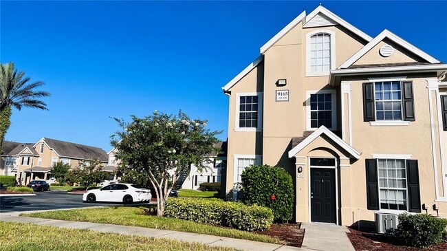Building Photo - 9165 Lee Vista Blvd Unit 108