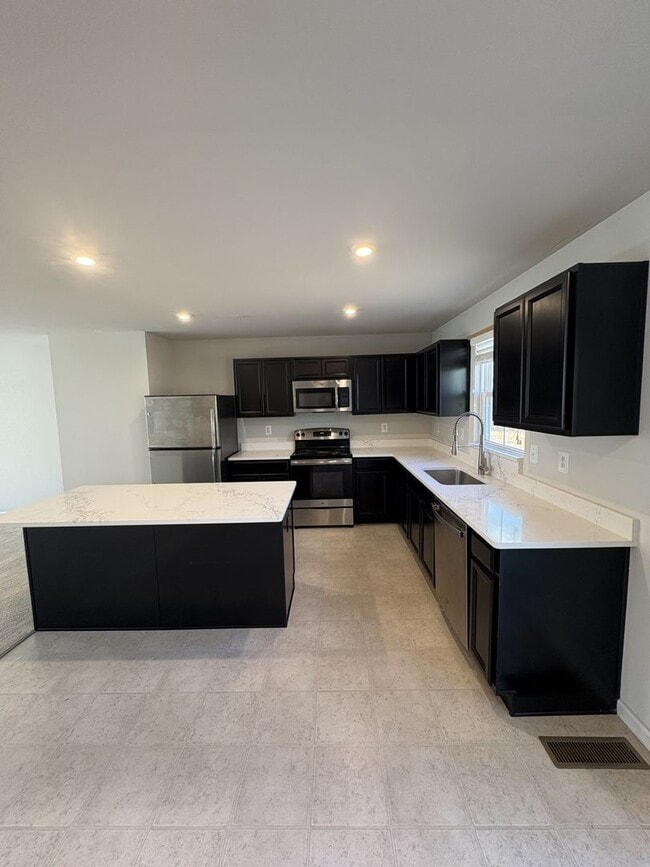 Photo - Stunning & Spacious Middle River 4bd/2.5ba Home with W/D, AC, Garage and more! Available now