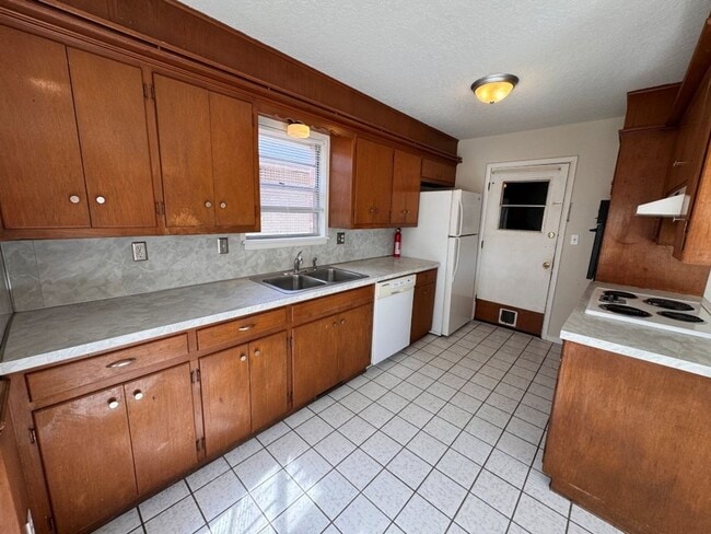 Photo - Huge fenced yard, charming 3-bedroom Norman home ready for move in!