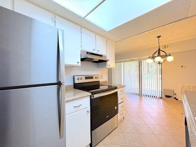 Photo - Welcome to this beautifully maintained first-floor condominium offering 2 bedrooms and 2 full bat... Unidad 1B