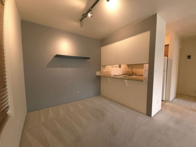 Photo - Elevated Living: Top-Floor 1 Bedroom Apartment with Mountain Views for a Serene and Scenic Lifestyle Unit 13