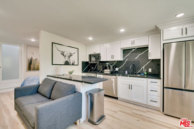 Building Photo - 8761 Dorrington Ave Unit B