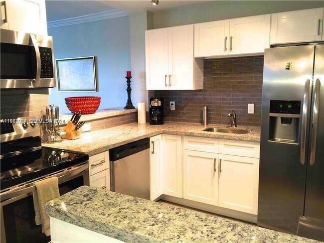 Building Photo - 1881 Middle River Dr Unit 604