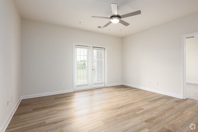 Willow - 1170 pies cuadrados - Sala de estar - Arrowhead Apartments