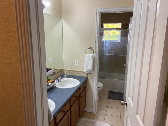 Photo - 10614 Belle Creek Blvd Unit Upstairs Bedroom