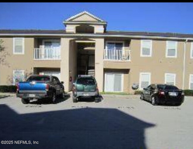 Building Photo - 7920 Merrill Rd Unit 1012