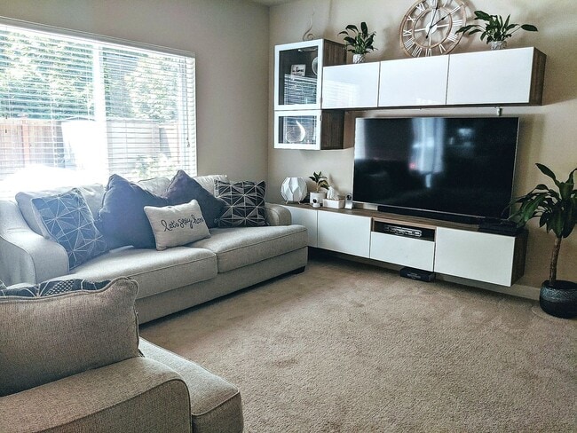 Photo - Stunning three bedroom in CK school district with fully fenced yard, corner lot, AC and more!