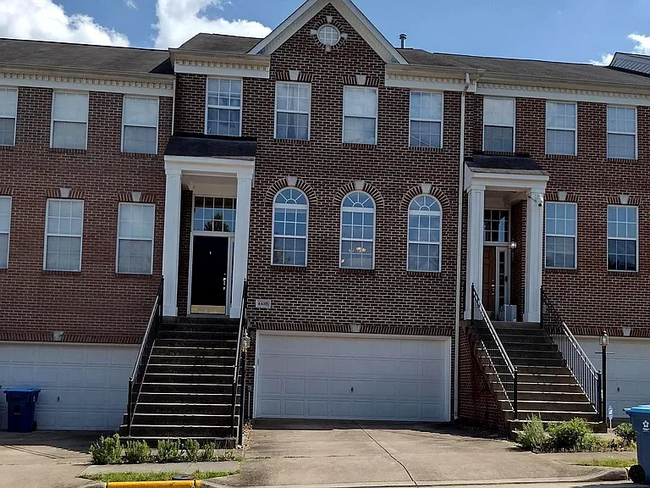 Outside Brick Front - 44315 Rowley Ter Townhome