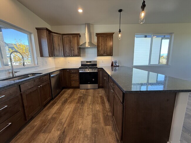 Photo - Lock-and-Leave Luxury Living — Lawn Care &...