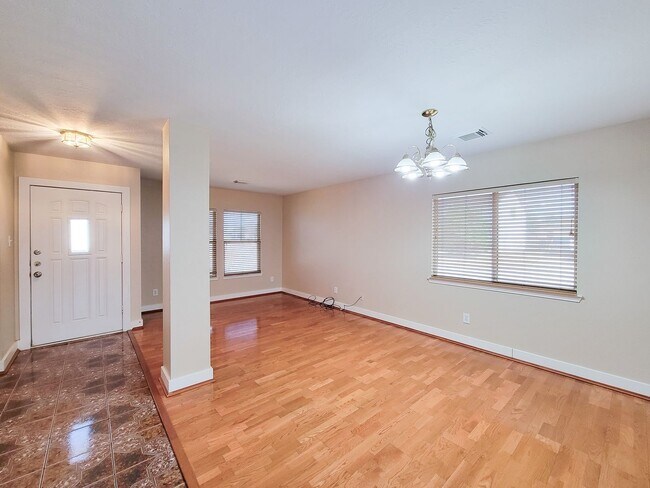 Photo - 3 bedroom one story home on large corner lot. Home has hard flooring throughout living areas and ...