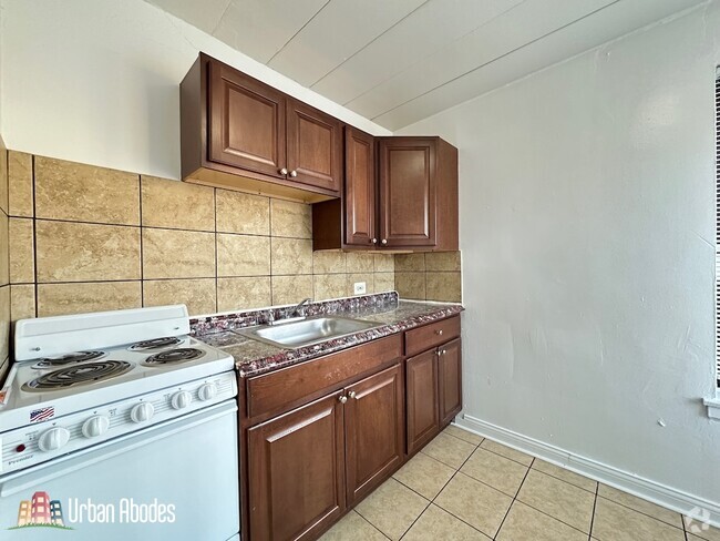 Building Photo - 1359 W Touhy Ave Unit M01B Rental