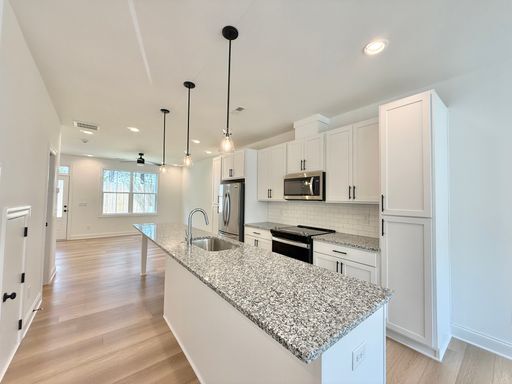 Photo - **OFFERING $125 RENT DISCOUNT FOR FIRST 6 MONTHS** Newly Built 4BD, 3.5BA Raleigh Townhome in a G...