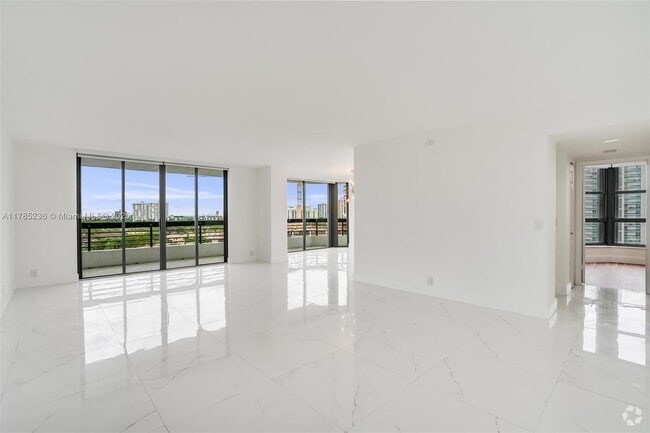 Building Photo - 3500 Mystic Pointe Dr Unit 1205 Rental