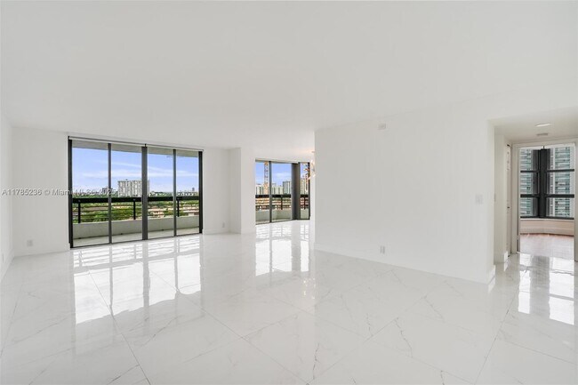 Building Photo - 3500 Mystic Pointe Dr Unit 1205 Rental