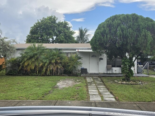 1280 NE 214th St