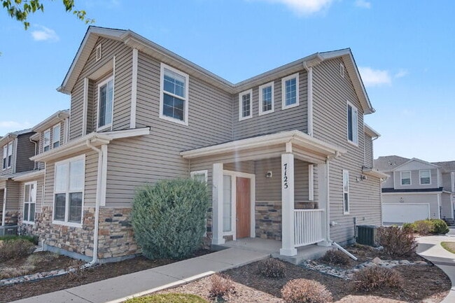 Building Photo - Beautifully Updated 3-Bedroom End-Unit Townhome Facing Open Space with Attached 2-Car Garage in G...