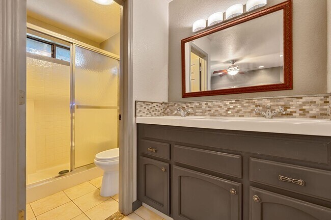 Photo - Charming 3-Bed Home in Gated Community with Updated Interiors & Private Yard!